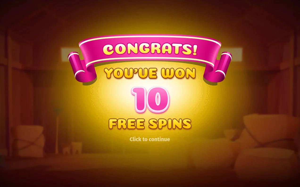 En rosa banderoll meddelar att spelaren vunnit 10 Free Spins, med uppmaningen Click to continue.